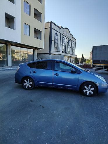 ford ehtiyat hisseleri: Toyota Prius (2-ci nəsil) hibrid hetçbek - Rəng: mavi - Salon: boz — 5