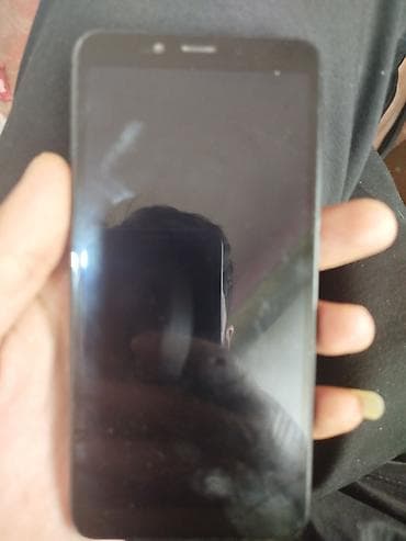 Xiaomi Redmi (MIUI interfeysi ilə) smartfon 50 Xüsusiyyətlər: - Ekran — 1