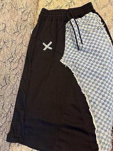 Мужская одежда: Unikal dizaynlı midi ətək Xüsusiyyətlər: - Model: assimetriyalı skort — 1