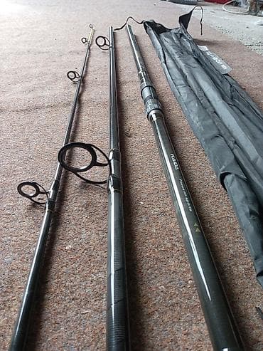 qara canta: KAIDA Archer 390 – 3 hissəli surf qamış. Kaida Carlos 8000. Üstündə — 2