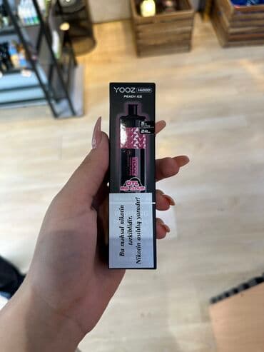 Məhsulun adı: Yooz Tüstü sayı: 14 000 Məhsul haqqında:E-maye və