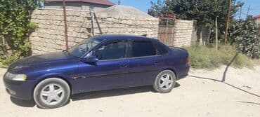 Su nəqliyyatı: Opel Vectra sedan – mavi rəng - Kuzov: 4 qapılı sedan, göy/mavi rəng — 5