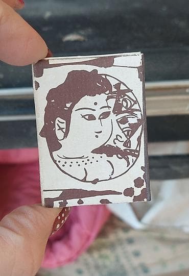 Kibrit qutusu – üzərində şərq üslubunda qadın portreti təsviri olan