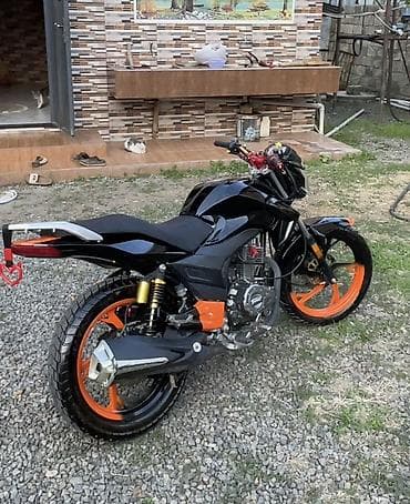 ford tekeri: Motosiklet – küçə/naked tip Xüsusiyyətlər: - Rəng: parlaq qara gövdə — 2