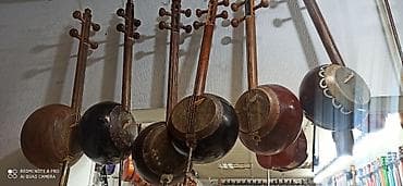 250 manatdan başlayan kamançalar Rast musiqi alətləri mağazası — 1