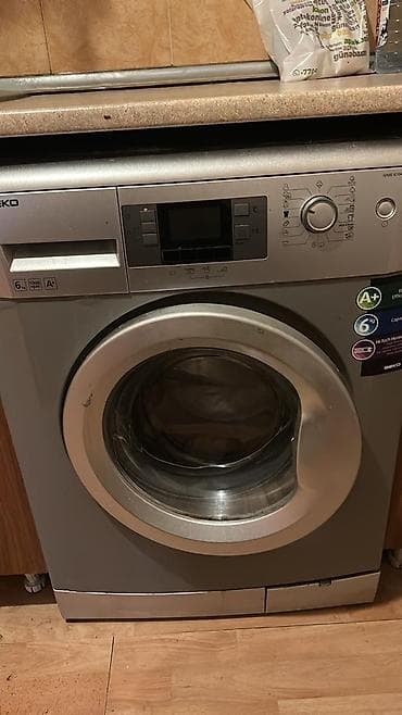 smart lock qw: Beko paltaryuyan 250 azn — 1