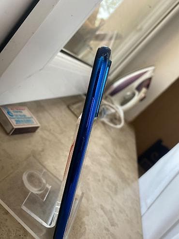 redmi 12 not: Xiaomi Redmi (mavi rəng) - Arxa dördlü kamera sistemi: 48 MP AI əsas — 2
