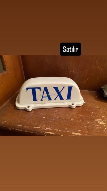 Bu, taksi xidmətləri üçün nəzərdə tutulmuş ağ rəngli, üstünə "TAXI" lalafo.az -da Bu, taksi xidmətləri üçün nəzərdə tutulmuş ağ rəngli, üstünə "TAXI"