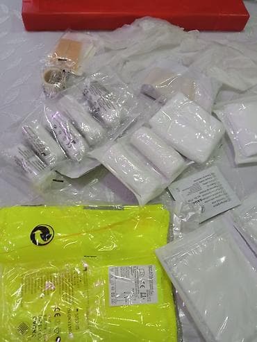 əlcek: Avtomobil üçün təcili yardım çantası, üstündə Tayuta yazılan canta 25 — 7