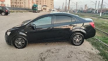 Chevrolet: Chevrolet Aveo sedan – qara rəng, 4 qapı, masin normal vezyetdedi — 1