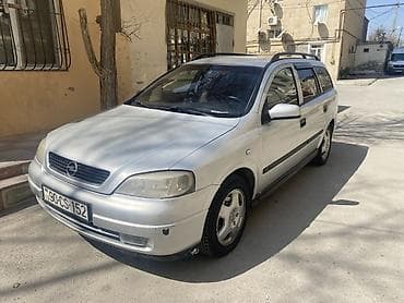 fiat brava 2001: Opel Astra Caravan (universal) – benzinli, avtomatik ötürücülü ailə — 4