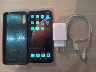 rəsmi 9 s: Redmi 9a mavi rəng, sensor -32gb 2ram - 2 sim kartlı - 32mp kamera — 9