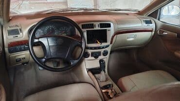 Ножи: Toyota Avensis sedan - Kuzov: 4 qapılı sedan, boz rəng - Salon: bej — 3