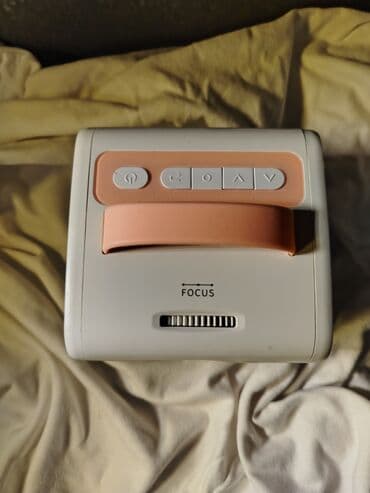 Smart TV bokslar: Yeni Portativ Proyektor Ünvandan götürmə — 2