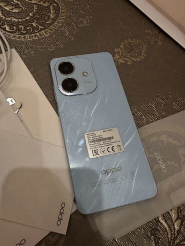 ТВ и видео: Oppo A3x, 64 ГБ, цвет - Синий, С документами — 1