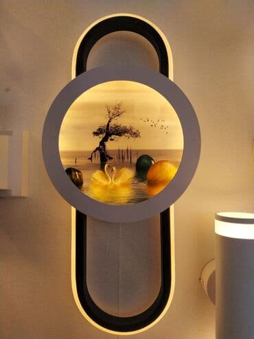 Divara quraşdırılan, oval formalı, dekorativ işıqlıq. İçərisində göl lalafo.az -da Divara quraşdırılan, oval formalı, dekorativ işıqlıq. İçərisində göl