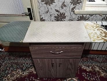 Həm ütü masasıdır həm də skaf . Çox az istifadə edilib. Heç bir