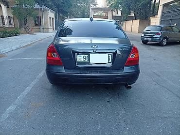 lider disk: Hyundai Elantra: 2 l | 2003 il Sedan — 2
