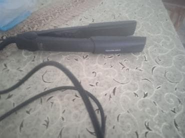 plastilin lovhesi: Rowenta saç ütüsü - Tip: Elektriklə işləyən saç düzləndiricisi - — 1