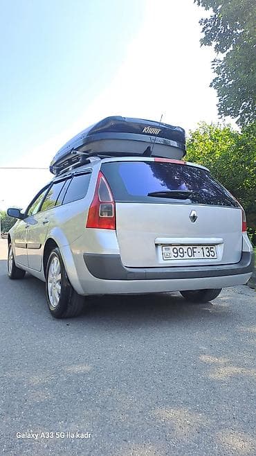 çanqan uni z: Renault Megane Grandtour – universallı kuzov, gümüşü rəng. Şəhərdən — 2