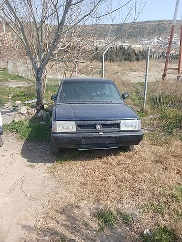 baz 2106: Maşın: Kağan (sedan) Kuzov: 4 qapılı, tünd mavi rəng Yanacaq: Benzin — 2