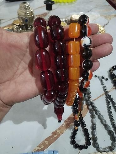 ebonit tesbeh: Məhsul: Təsbeh və muncuq dəstləri Təsvir: - Qırmızı şəffaf kəhrəba — 2