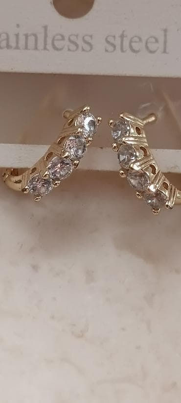 Бижутерия: Qızılı rəngdə zərif aksesuar dəsti. - Sırğa 1) “Stainless steel” — 1