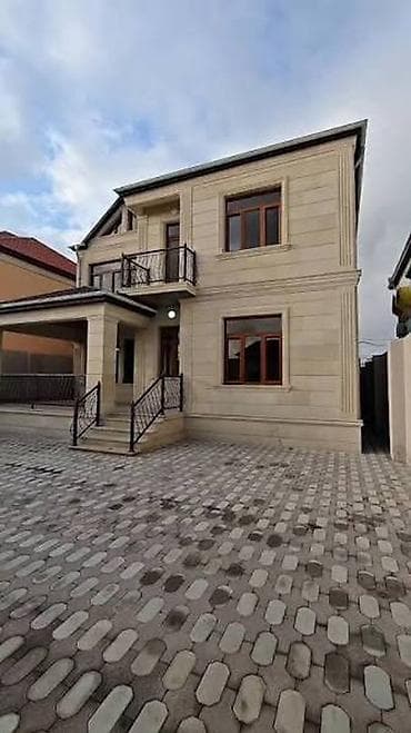 Kommersiya daşınmaz əmlakı: İki mərtəbəli geniş həyət evi - Fasad: aqlay üzlü, müasir dizayn — 1