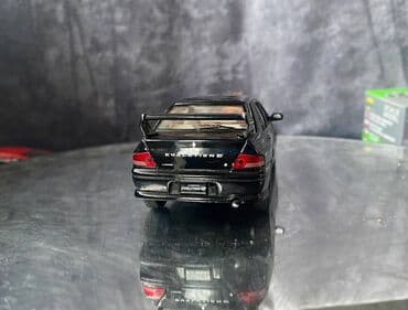 maşın modeli: Коллекционная модель Mitsubishi Lancer Evolution VII black 2002 — 8