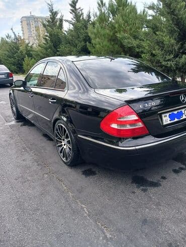 Tavalar: Mercedes-Benz E 320: 3.2 l | 2003 il Sedan — 3