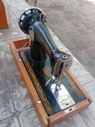 kulçater azerbaycan dilinde: Gədim tikiş maşını
işlək — 1