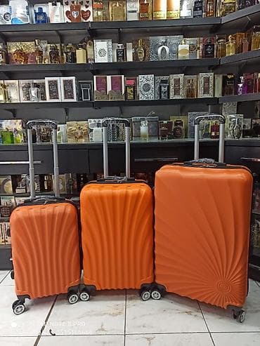 Çamadanlar: 3-lü səyahət çemodan dəsti – narıncı rəng - Material: sərt və yüngül — 1