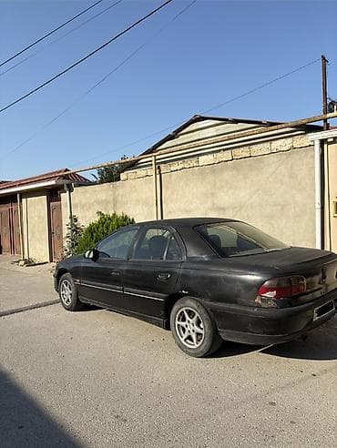 vaz 2107 abilsofka: Opel Omega B, sedan, qara rəng. Texniki və funksional xüsusiyyətlər — 3