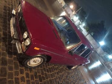 175 70 13 təkər: VAZ 2106 sedan - Kuzov: 4 qapılı, tünd bordo rəng. Xrom yan — 5