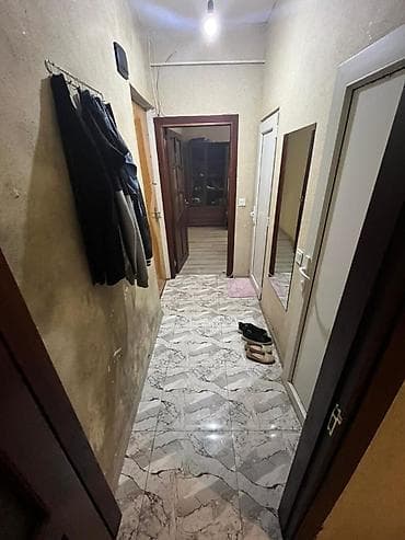 Nesimi metrosunun cixiwinda 5 mertebenin 1 ci mertebesinde temirli 2 — 5