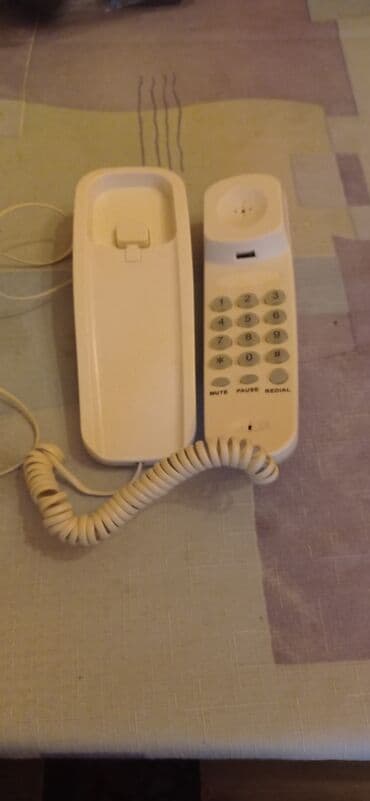 Stasionar telefon Simli, İşlənmiş, Ünvandan götürmə