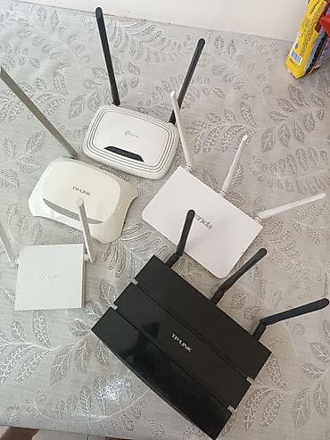 ucuz modemler: Wi‑Fi routerlər toplusu Brendlər: TP‑Link və Tenda. Korpusda müxtəlif — 1