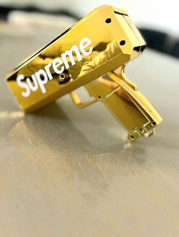 oyuncaq kassa: Məhsul: Supreme qızılı “Money Gun” (pul atıcı) Təsvir: - Parlaq — 3