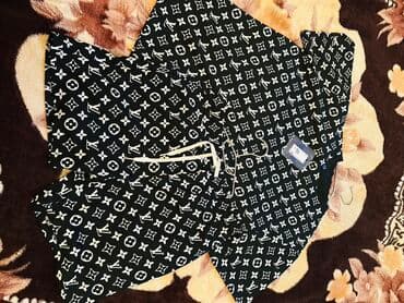 klassik geyim: Louis Vuitton firmasının qara rəngdə, ağ naxışlı dəsti. Parisdən 900€ — 1