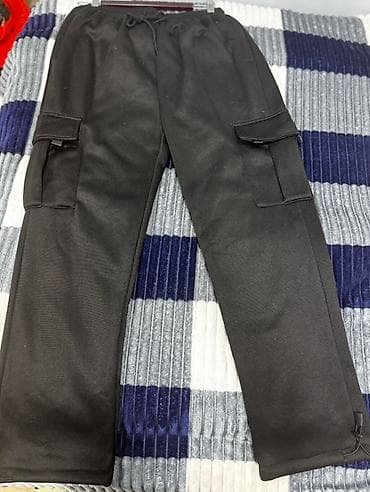 Kişi Geyimləri: Qara rəngli kişi cargo şalvarı Tezedi hec istifade olunmuyub Razmer — 3