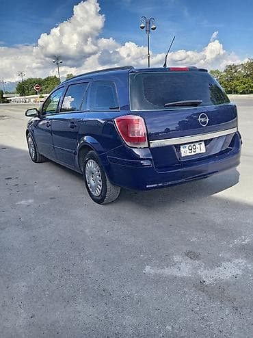 vaz 2006: Opel Astra: 1.4 l | 2006 il 260 km Universal — 2