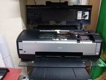 epson l800: 2 dənə Epson 1410 satılır. Biri 19629 digəri 26975 çap vurub. Ünvan — 5