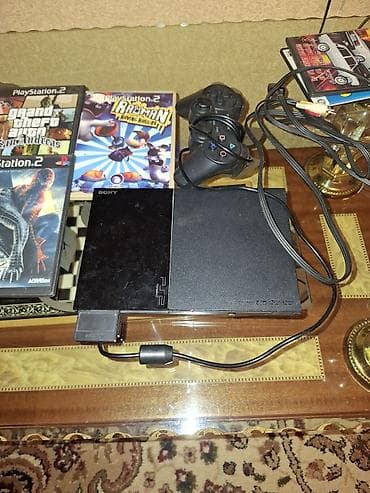 PlayStation 2 Slim (Sony) oyun konsolu seti.Cox az işlənib. Komplekt