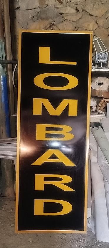 Məhsul: “LOMBARD” reklam lövhəsi - Vertikal dizayn: qara fon üzərində