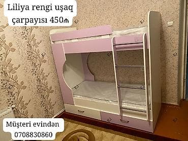 Liliya rəngində iki mərtəbəli uşaq çarpayısı. Üst mərtəbəyə — 1