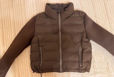 Куртки новые