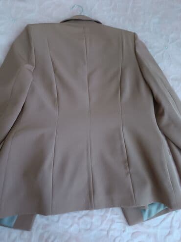 kostyum qadin ucun: Razmeri uyğun gəlmədiyi üçün satılır.50 azn — 4