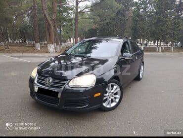 Volkswagen Jetta: 2 l | 2009 il Sedan