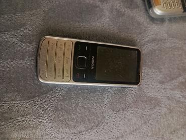 ses ucaldan: Nokia 1, rəng - Gümüşü, Düyməli — 2