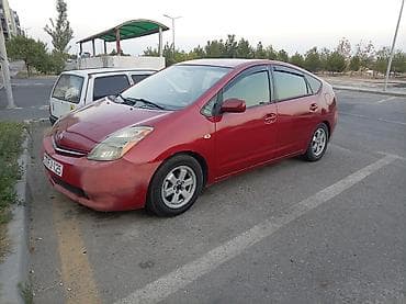 barter disk: Toyota Prius (ikinci nəsil) – qırmızı rəngli, 5 qapılı hibrid liftbek — 1